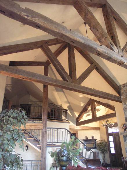 Hand-Hewn Timbers and Trusses / These hand-hewn timbers were stained by the contractor before installation